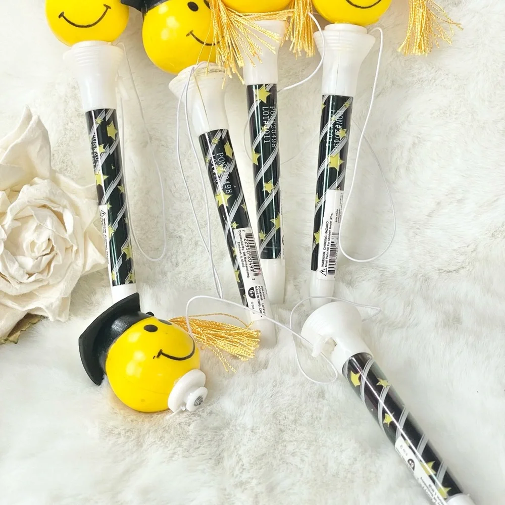 New with tags SPRING LOADED GRADUATION POP OFFS Set of 5. GRAD CAP with TASSEL
